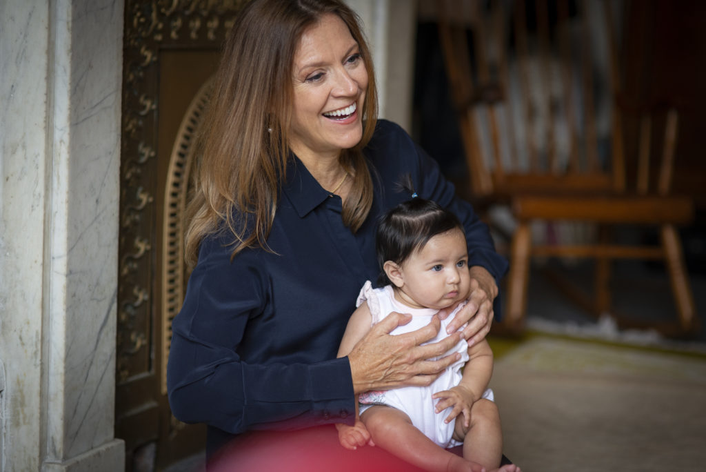 Jennifer working with a baby